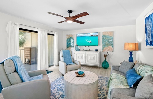 Destin Condo | Sip a glass of wine on our balcony Private Beachfront views pool large courtyard