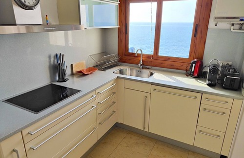 Sitges Apartment | Sitges. Mediterranean Balcony. Amazing views. Beach and pool. A/C. Parking. WIFI