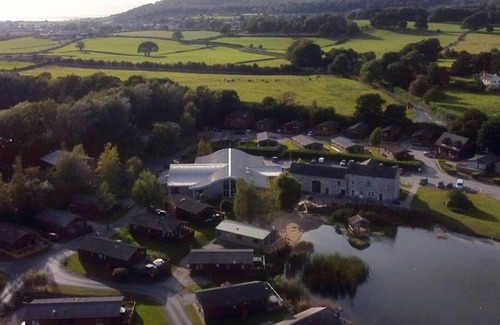 Carnforth House | Situated at Borwick Lakes, this holiday home boasts a spacious feel.
