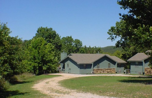 Holiday Island Condo | Six-Person Hot Tub, Lakeside, King Beds, Fireplace!