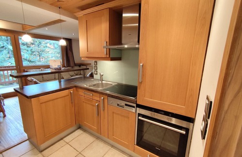 Meribel Centre Apartment | Ski-in/ski-out apartment for 7 in Méribel center, renovated, balcony, 3 bedrooms, fireplace