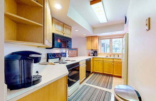 Ludlow Condo | Ski-in/ski-out condo with pool, hot tub, sauna, mountain view, deck, & fireplace