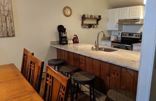 Ludlow House | Ski on, ski off four bedroom trailside condo at Okemo