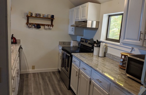 Ludlow House | Ski on, ski off four bedroom trailside condo at Okemo