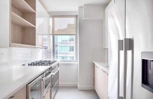 Lincoln Square Apartment | Sleek UWS 2BR w/Gym, Balcony & W/D, nr Central Park, by Blueground