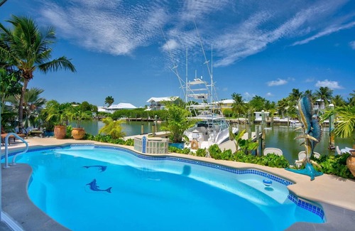 Marathon House | Sleeps 10 - Private house with 110’ of Deep Water Dockage, Pool, Hot Tub & more!