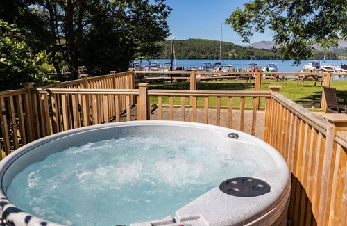Windermere Cabin | Sleeps 4 plus a tiny tot. Fabulous lake views with spacious outside terrace and hot tub