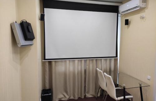 Petrovskoye Apartment | Small room with big cinema