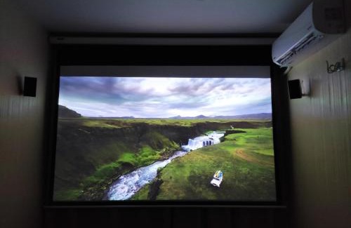 Petrovskoye Apartment | Small room with big cinema