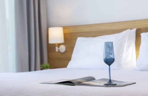 Nidri Hotel | Smile Inn Luxury Accommodation nIn the center of Nidri, next to the sea