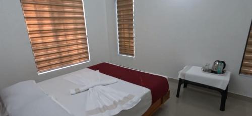 Sulthan Bathery Hotel | Smile Residency