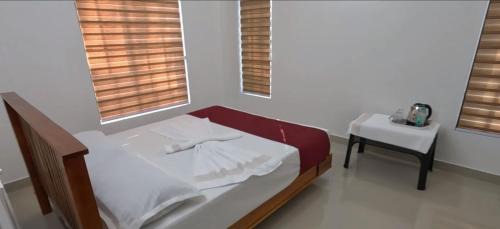 Sulthan Bathery Hotel | Smile Residency