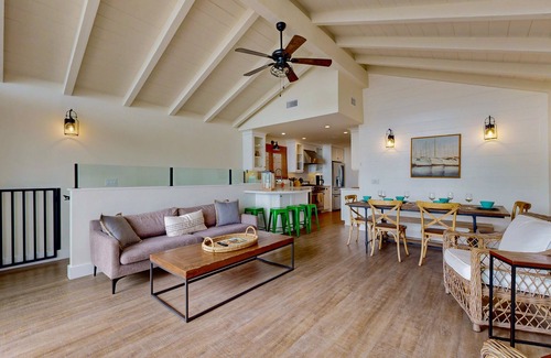 Balboa Peninsula House | Snowbird-friendly waterfront oasis near golf with beach access, balcony, & W/D