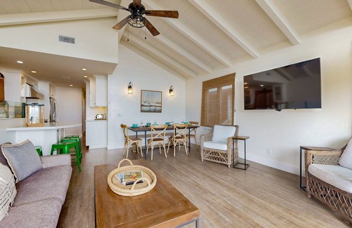 Balboa Peninsula House | Snowbird-friendly waterfront oasis near golf with beach access, balcony, & W/D