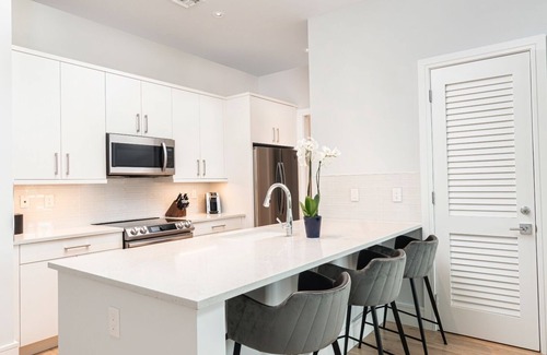 Old Naples Condo | SOCE FLATS 210 - Modern Loft Overlooking 5th Ave S in Olde Naples!