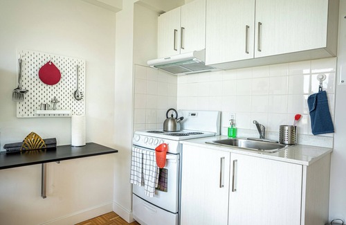 Little Burgundy Apartment | Sophistication at Dorchester Apartments