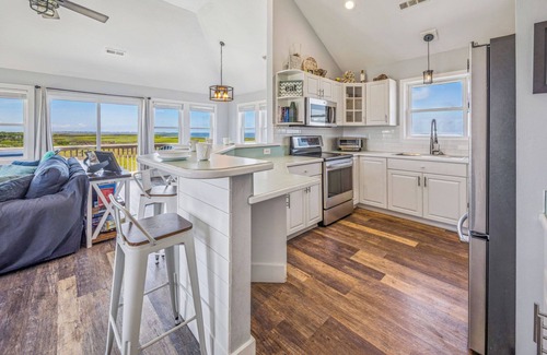 Frisco House | Soundfront Dog Friendly Home with Hot Tub, Game Room, Easy Windsports Access