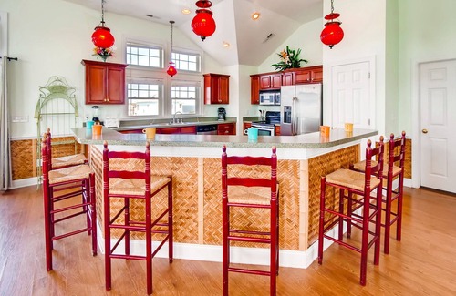 Wind Over Waves House | Soundside Home w/Pool, Hot Tub, Elevator, Game Room, Tiki Bar, and Much More!