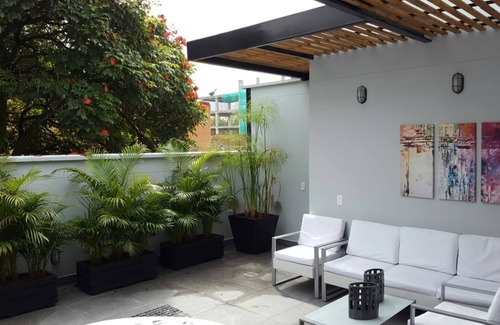 El Poblado House | Spacious 12-bedroom house in Medellín with 2 Private Rooftop Jacuzzis and AC