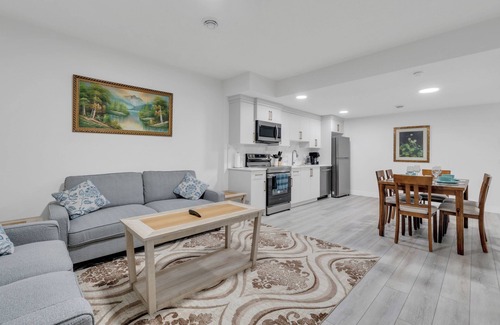 Calgary House | Spacious 2-Bedroom Legal Basement Suite | Private Entrance | 15 Mins to Airport