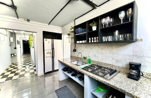 La Castellana House | Spacious 4-bed, 4-bath, industrial apartment with WiFi in Laureles