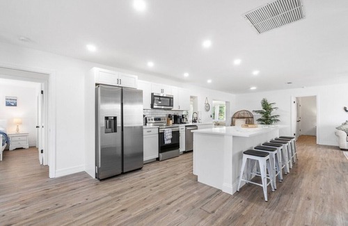 West Palm Beach House | Spacious 4-Bedroom West Palm Beach Pool Home w/Games, Lake Views & Beach Gear