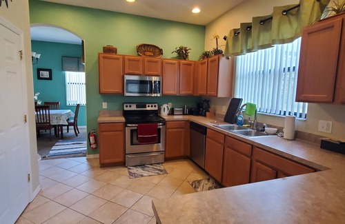 Calabria House | Spacious 5-Bdrm 4 bth pool home w/game room close to Disney, Epic Universe
