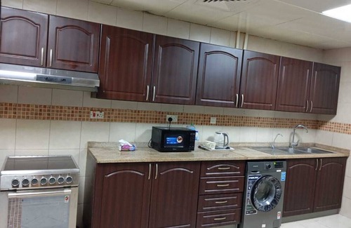 Abu Dhabi Apartment | Spacious 5-bedroom apartment in lovely Abu Dhabi with AC, WiFi