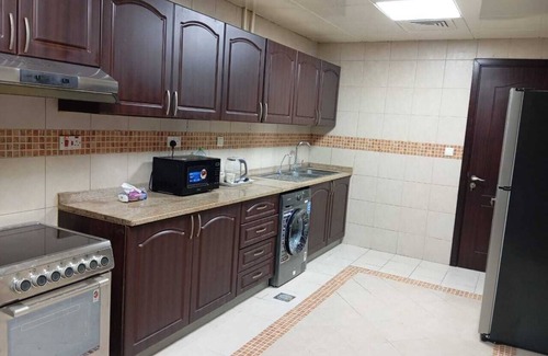 Abu Dhabi Apartment | Spacious 5-bedroom apartment in lovely Abu Dhabi with AC, WiFi
