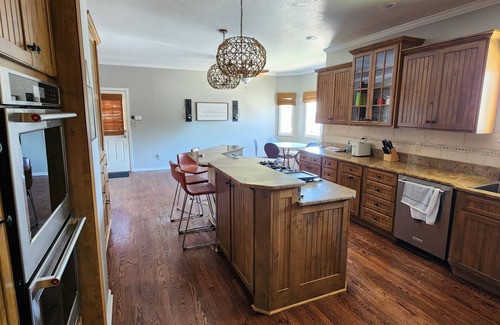 Cheyenne House | Spacious 5-bedroom Western retreat near, State Parks and Frontier Days Park.