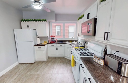 Irvington House | Spacious 6-bedroom townhome in charming Irvington with AC and Parking