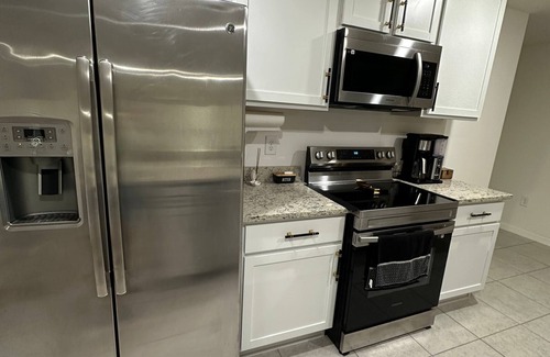 Port Charlotte House | Spacious and private bedroom in a modern new home in Port Charlotte with AC,WiFi