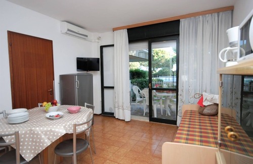 Lignano Riviera Apartment | Spacious apartment with pool access in exclusive residence