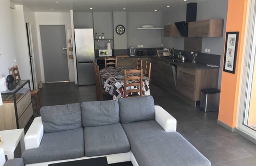 Cap d'Agde Apartment | Spacious apartment with terrace, solarium, parking and pool