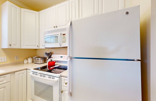 St. James Condo | Spacious condo with marina & Intercoastal views, screened-in balconies, W/D & AC