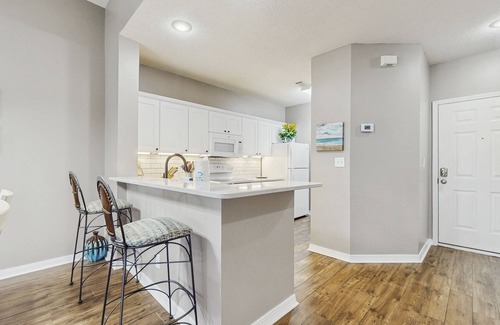 Gulf Shores Condo | Spacious condo with water views, private balcony, & on-site pool
