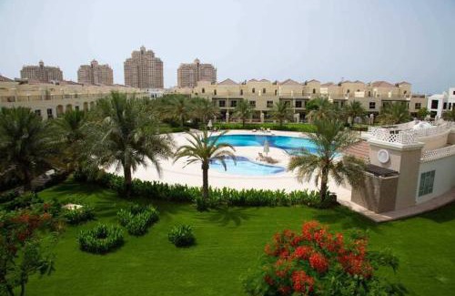 Al Hamra Village Villa | Spacious, Cozy Villa with Pool Access