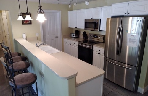 Traverse City Condo | Spacious Downtown, First Floor, Patio, sleeps up to 6, Short Walk to Everything!