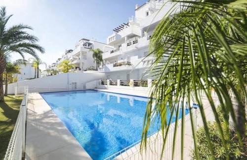Estepona Apartment | Spacious Estepona Apartment with Pool & Golf Views