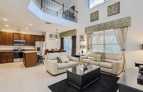 Watersong House | Spacious, Family Friendly home with Pool, Spa & Games. Minutes from Disney!
