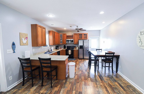 Gilbertsville House | Spacious Home in Moors Community on KY Lake with Outdoor Hot Tub and Fire Pit