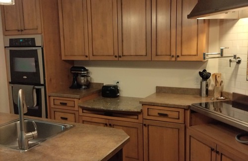 La Pointe House | Spacious home with EV charging station two miles from Big Bay Town Park.