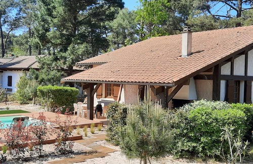 Biscarrosse Plage Villa | Spacious Landes house with private pool, near the beach, for 8 in Biscarrosse