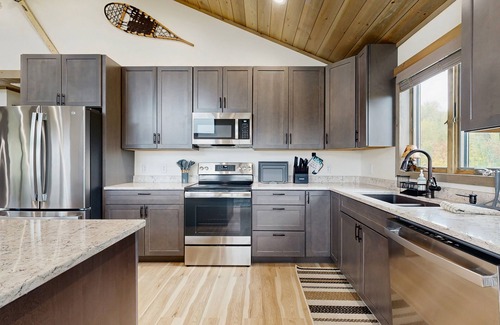 Sunday River Area House | Spacious mountain retreat with fire pit, hot tub, sauna, and foosball