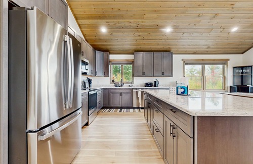 Sunday River Area House | Spacious mountain retreat with fire pit, hot tub, sauna, and foosball