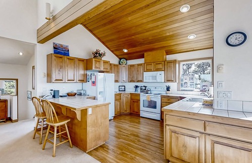 South Beach House | Spacious oceanfront home with free WiFi, fireplace, and wrap-around deck