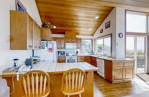 South Beach House | Spacious oceanfront home with free WiFi, fireplace, and wrap-around deck