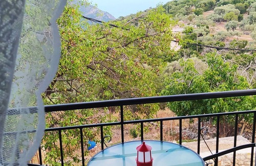 Fternon Apartment | Spacious quad studio, w/sea view, garden, just 10' drive from the beach!
