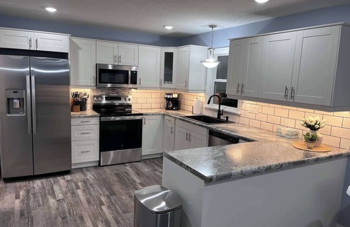 Sioux Falls House | Spacious Retreat with a Hot Tub and Theater Room