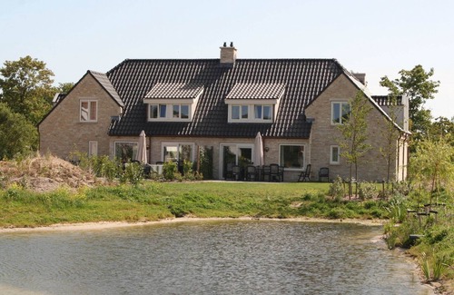 De Cocksdorp Villa | Spacious villa with deco fireplace on Texel